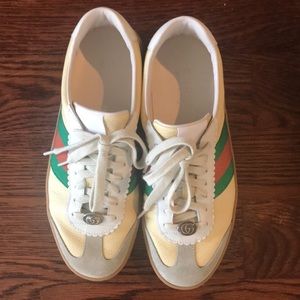 Gucci unisex gym shoes, leather w/suede trim. Gently worn, excellent condition.